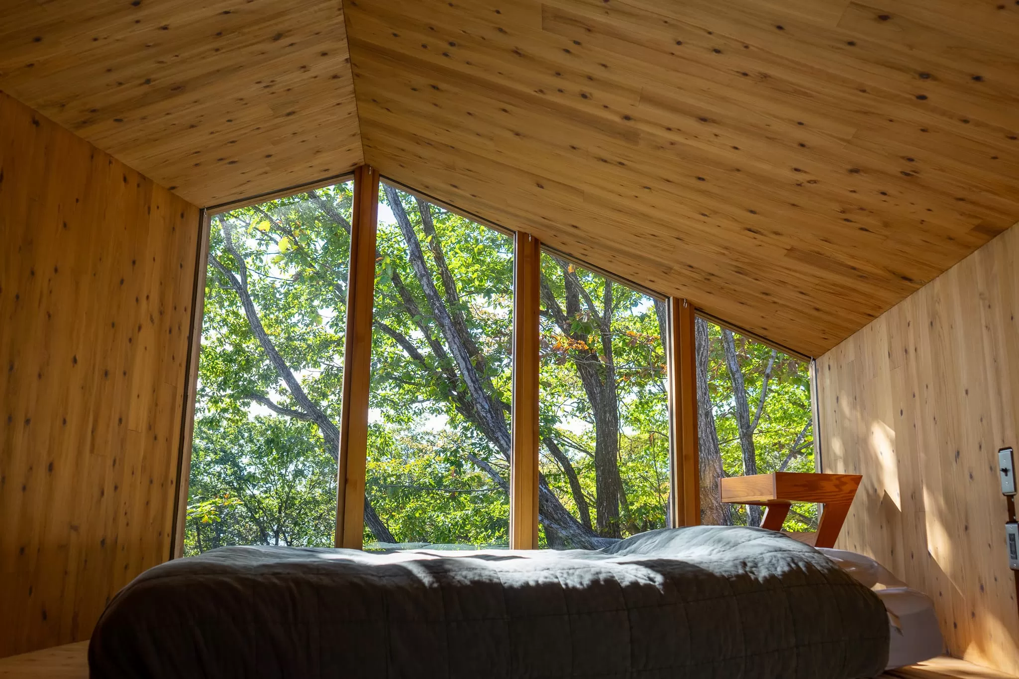 Each room is furnished with a plush queen-sized bed, ensuring a restful and comfortable stay.